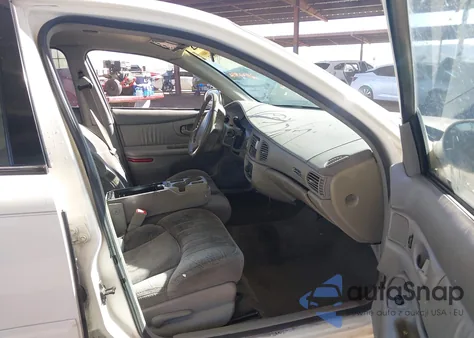 2001 Buick Century Custom z USA, uszkodzony, nr VIN 2G4WS52J111259282